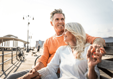 A couple enjoying retirement by the water